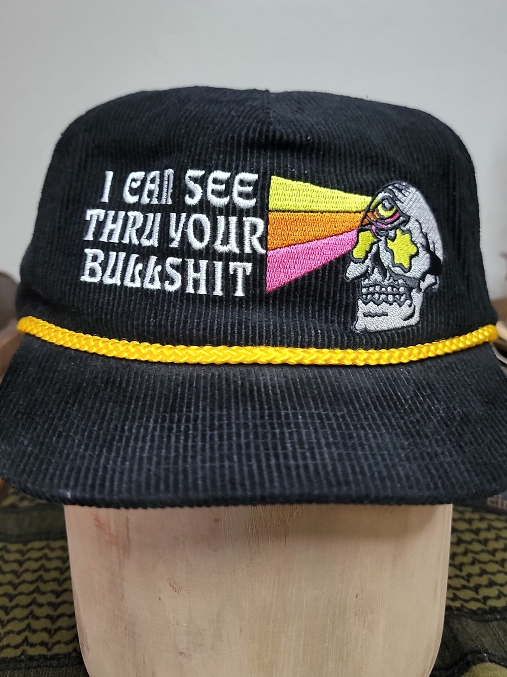 Black Embroidered Skull Snapback Hat with Yellow Rope Accent